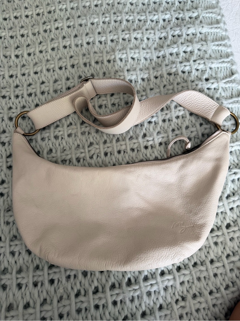 Pebbled Crescent Shoulder Bag in Light Cream